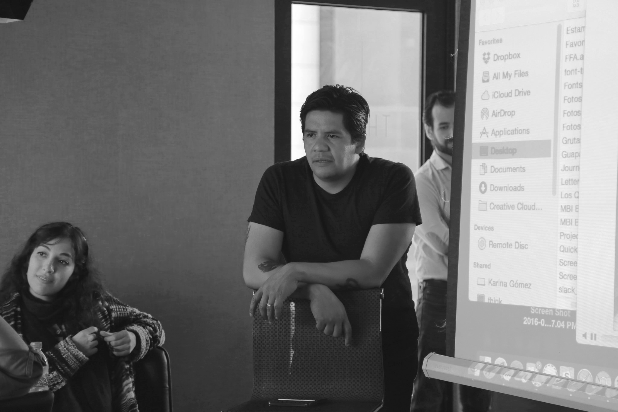 Man leaning on chair