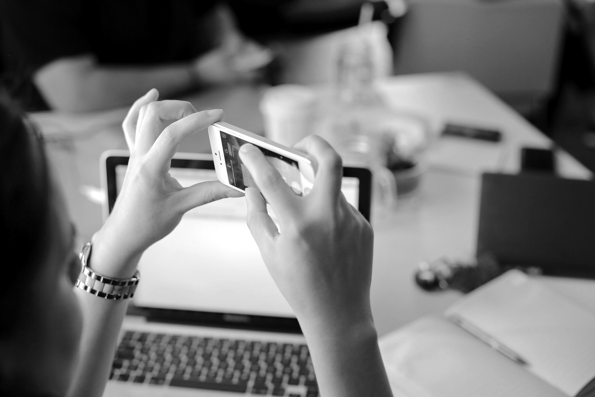 Woman taking picture on her phone