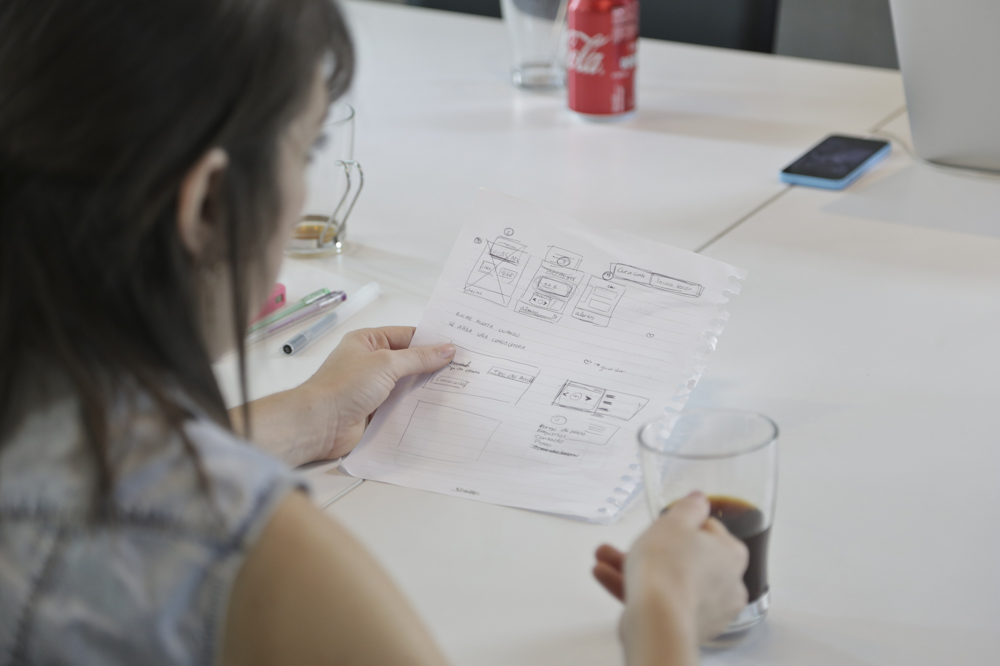 Woman revising sketch