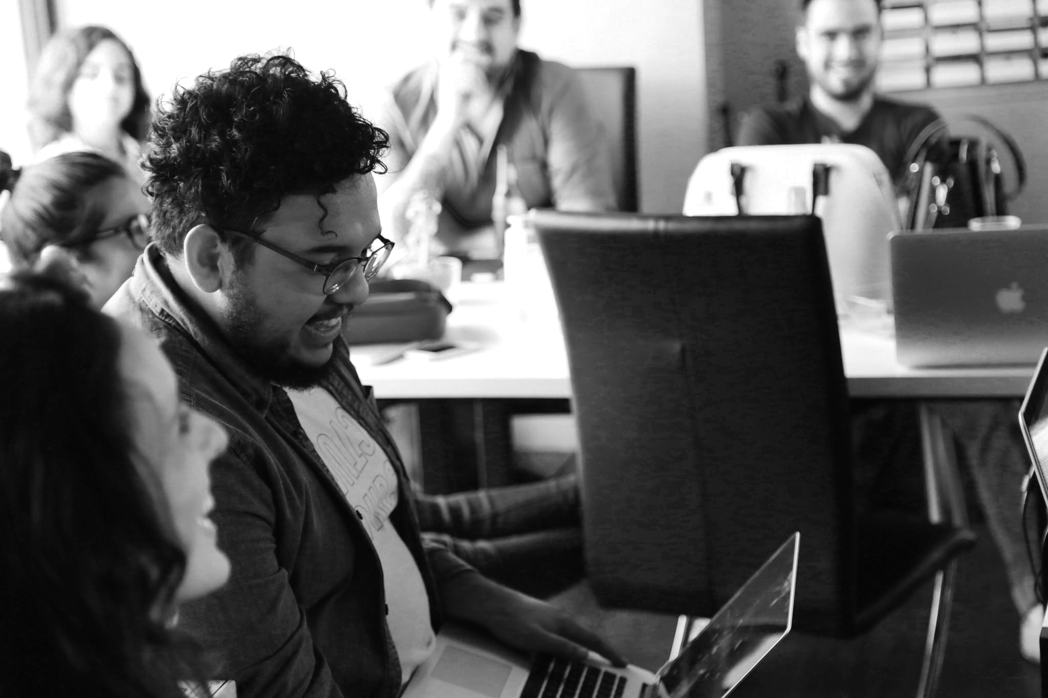 Man taking notes on his laptop