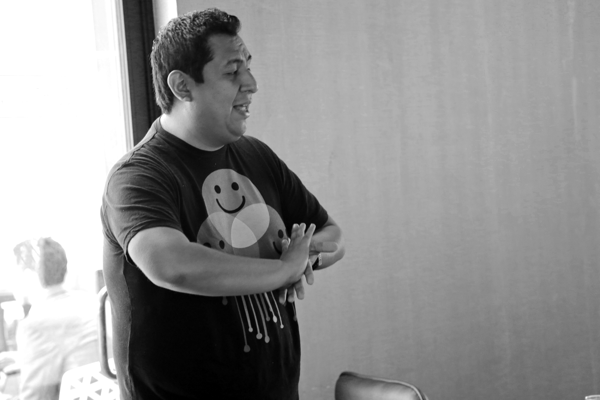 Man speaking at business meeting