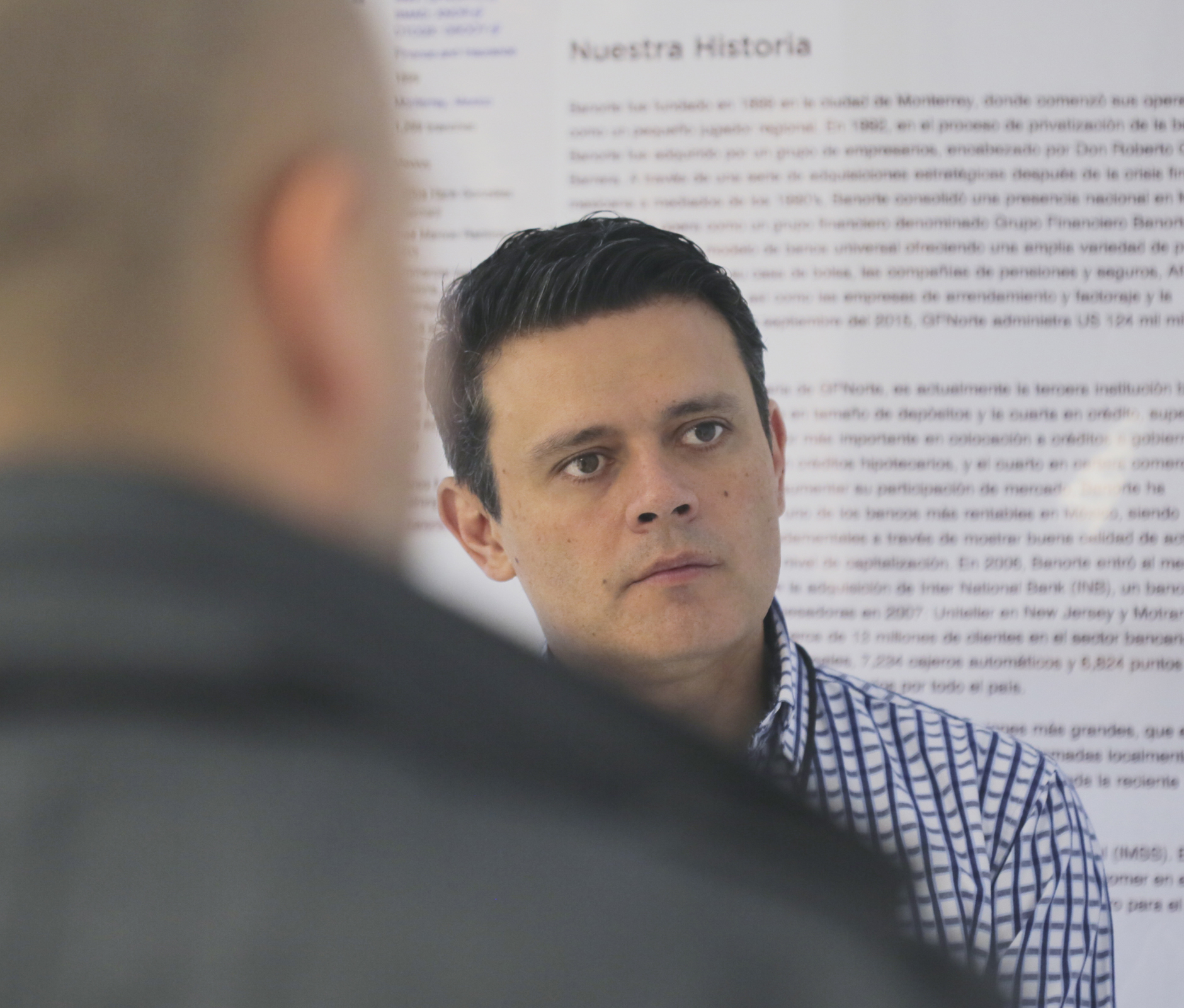 Businessman listening to his colleagues