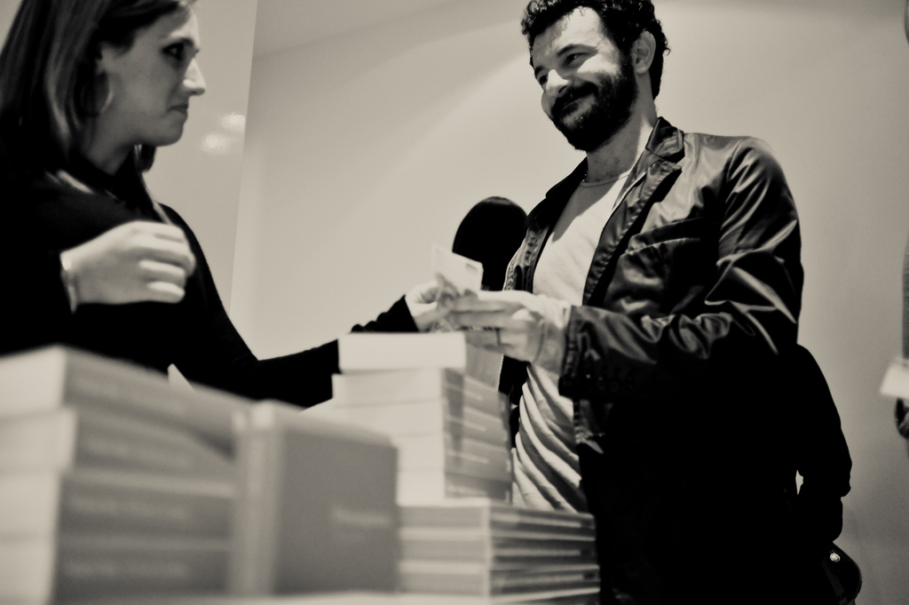 Man talking to woman