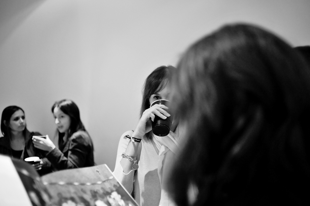 Woman drinking from red solo cup