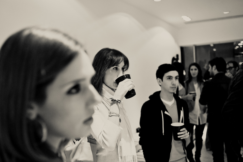 Woman drinking from red solo cup