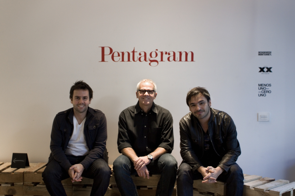 Gerardo Ortiz & Emmanuel Moreau posing with DJ stout at Pentagram book release party