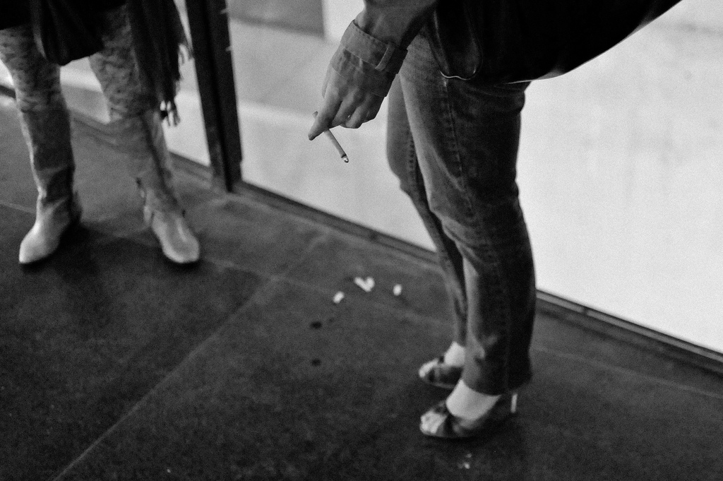 Man smoking at party