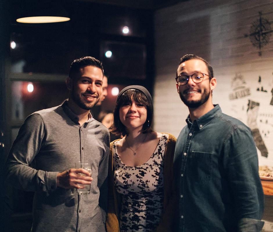 Friends posing for funny picture at bar