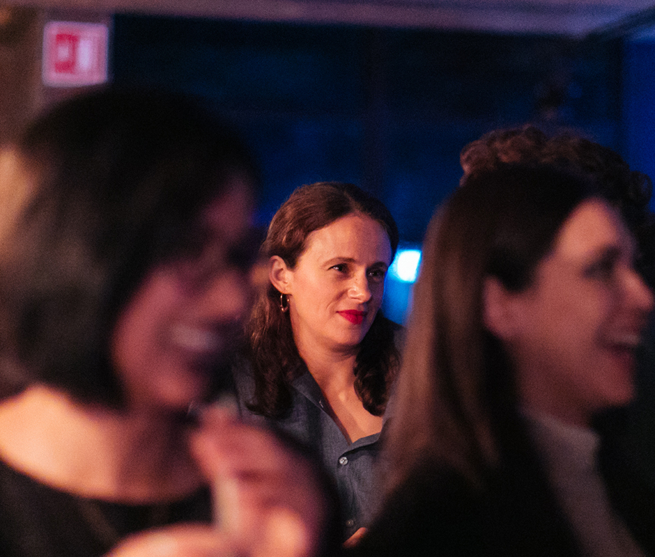 Woman watching bar stage