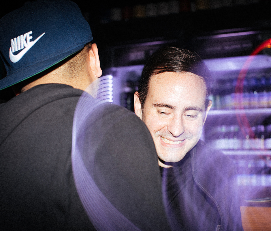 Man with friend at bar