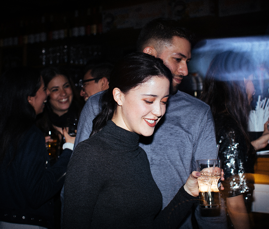 Bar party photographed with flash