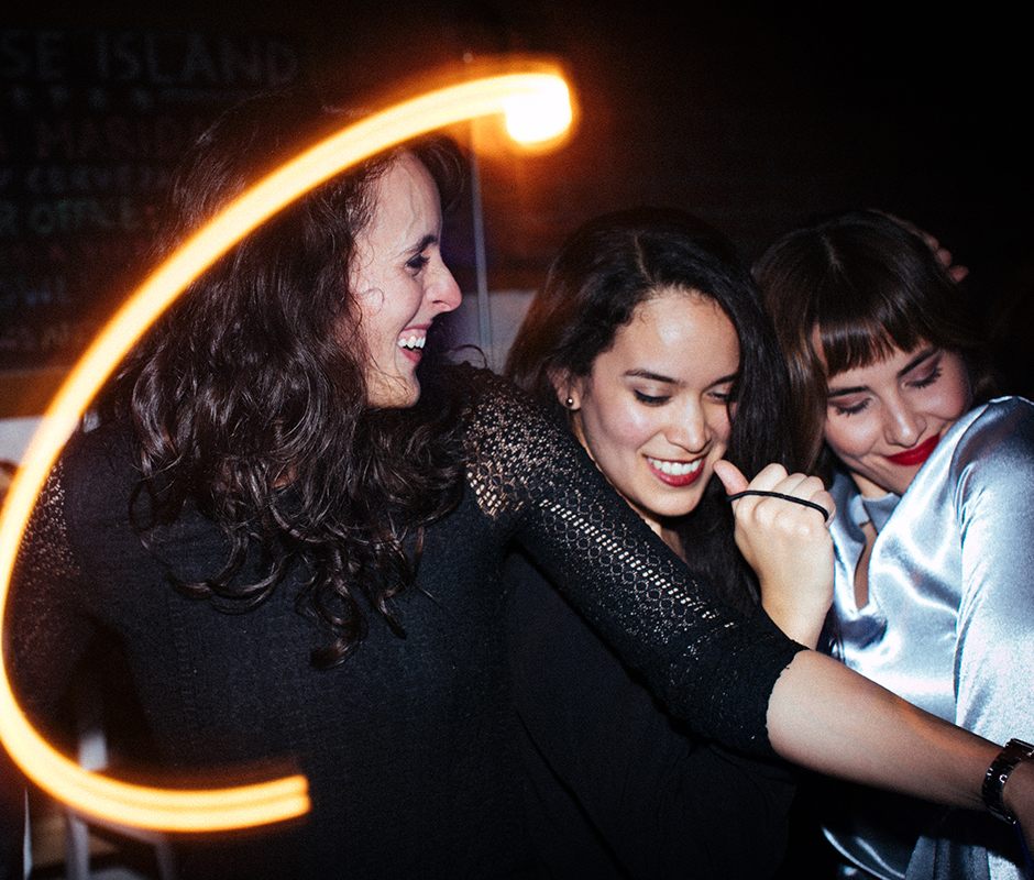 Picture of friends dancing with vintage flare effect