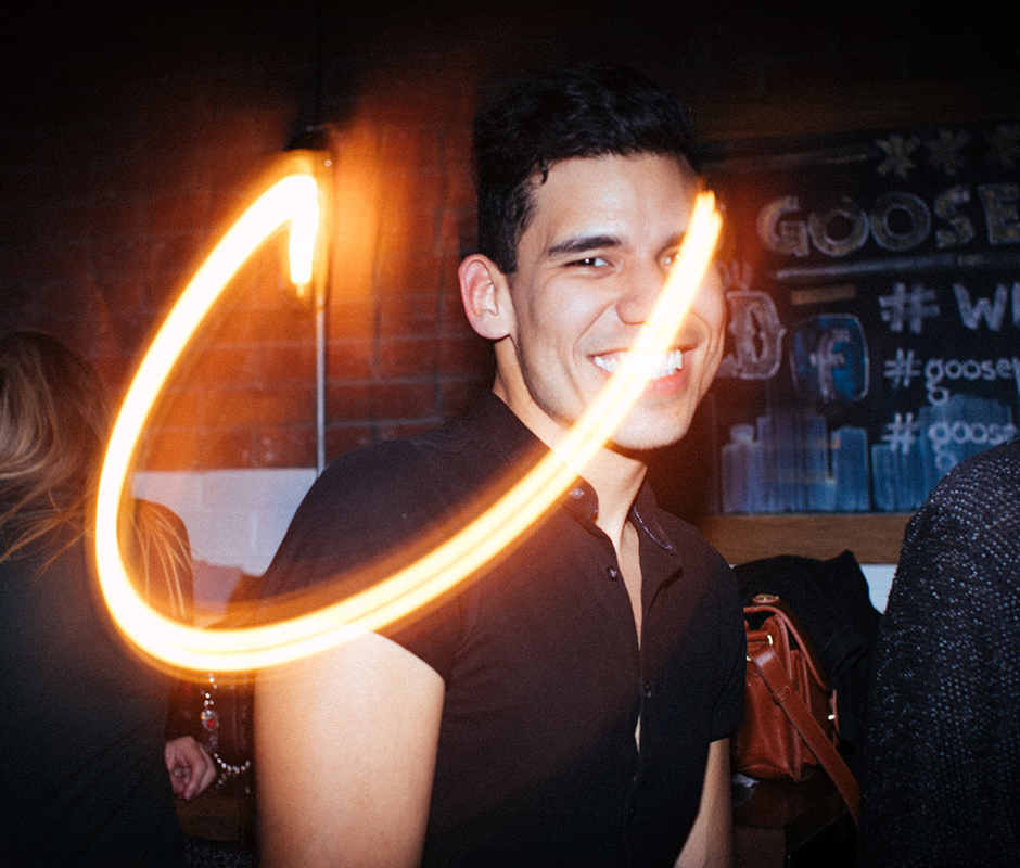 Man smiling for picture with vintage effect