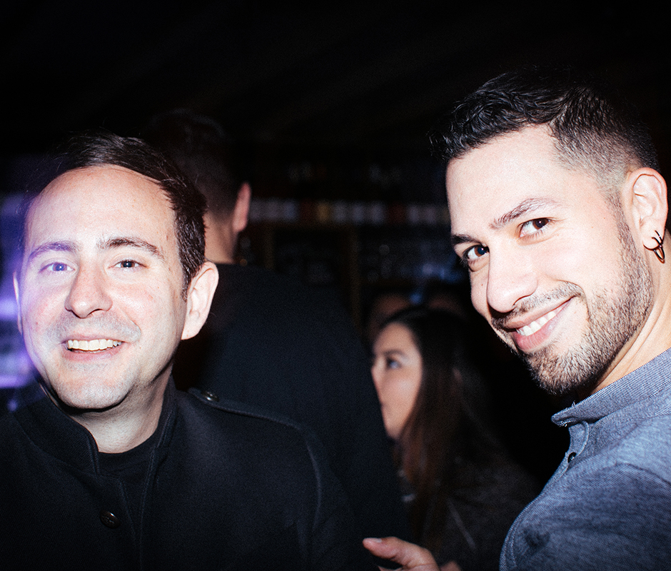 Two man smiling for picture