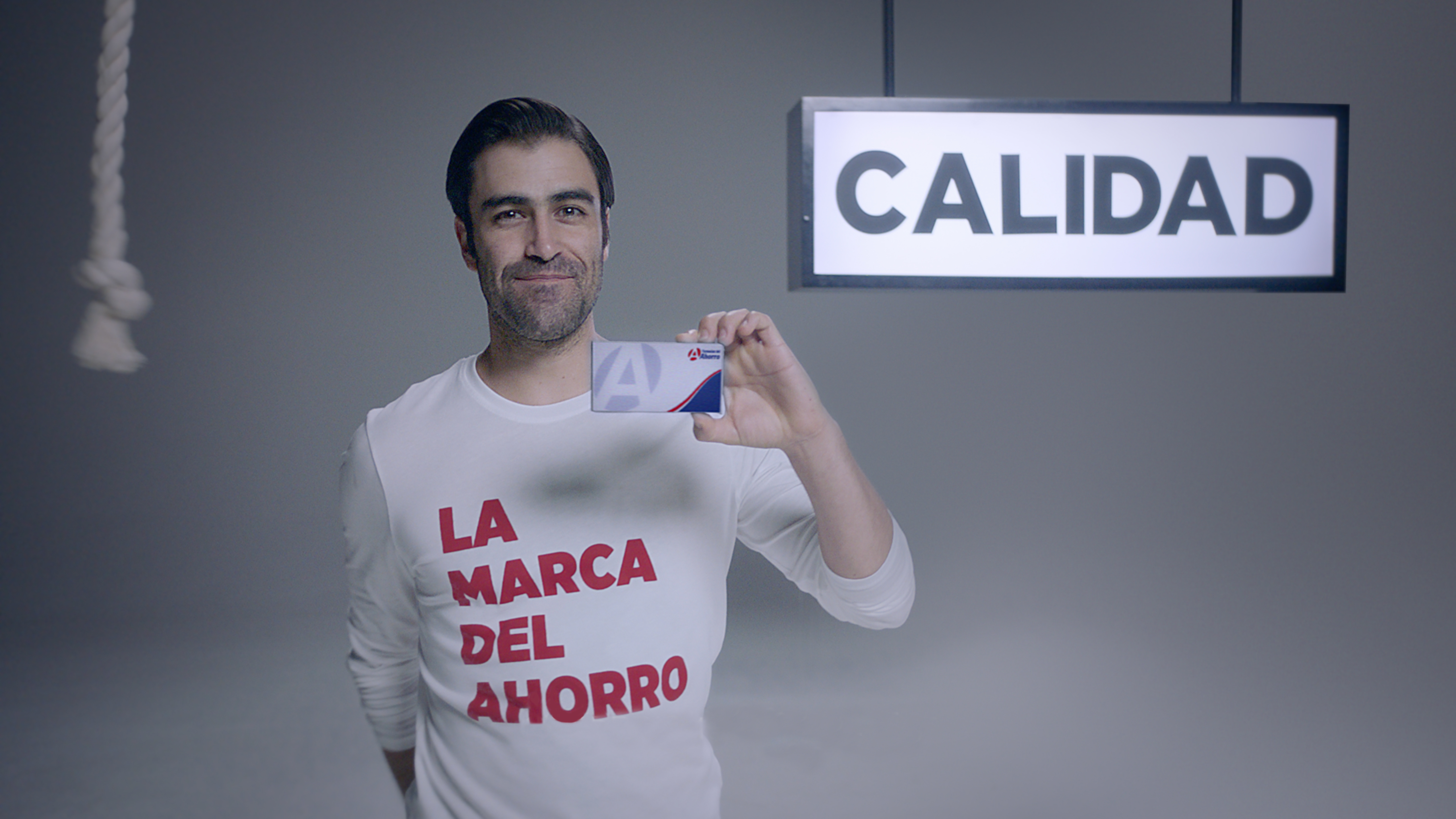 Man holding Farmacias del Ahorro pharmacy brand medicine