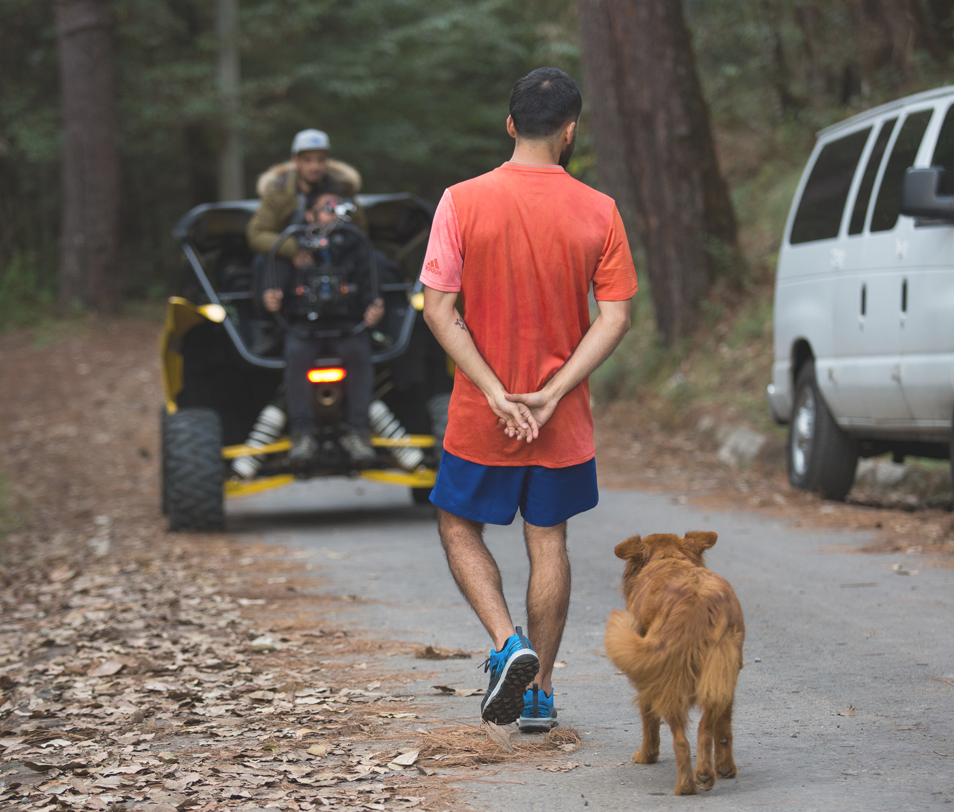 Man walking with his dog for sport brand commercial 