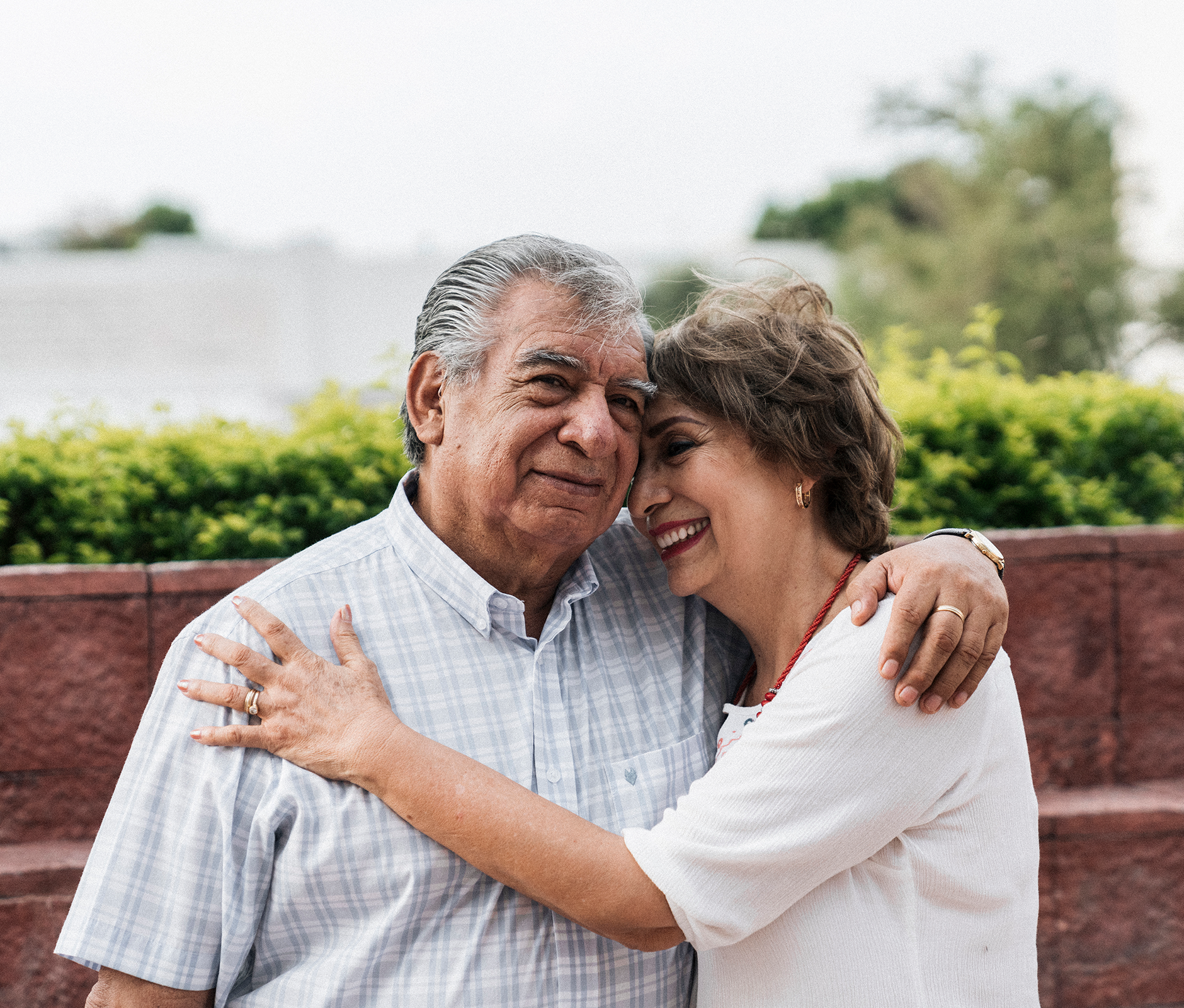 Old couple sharing a loving hug