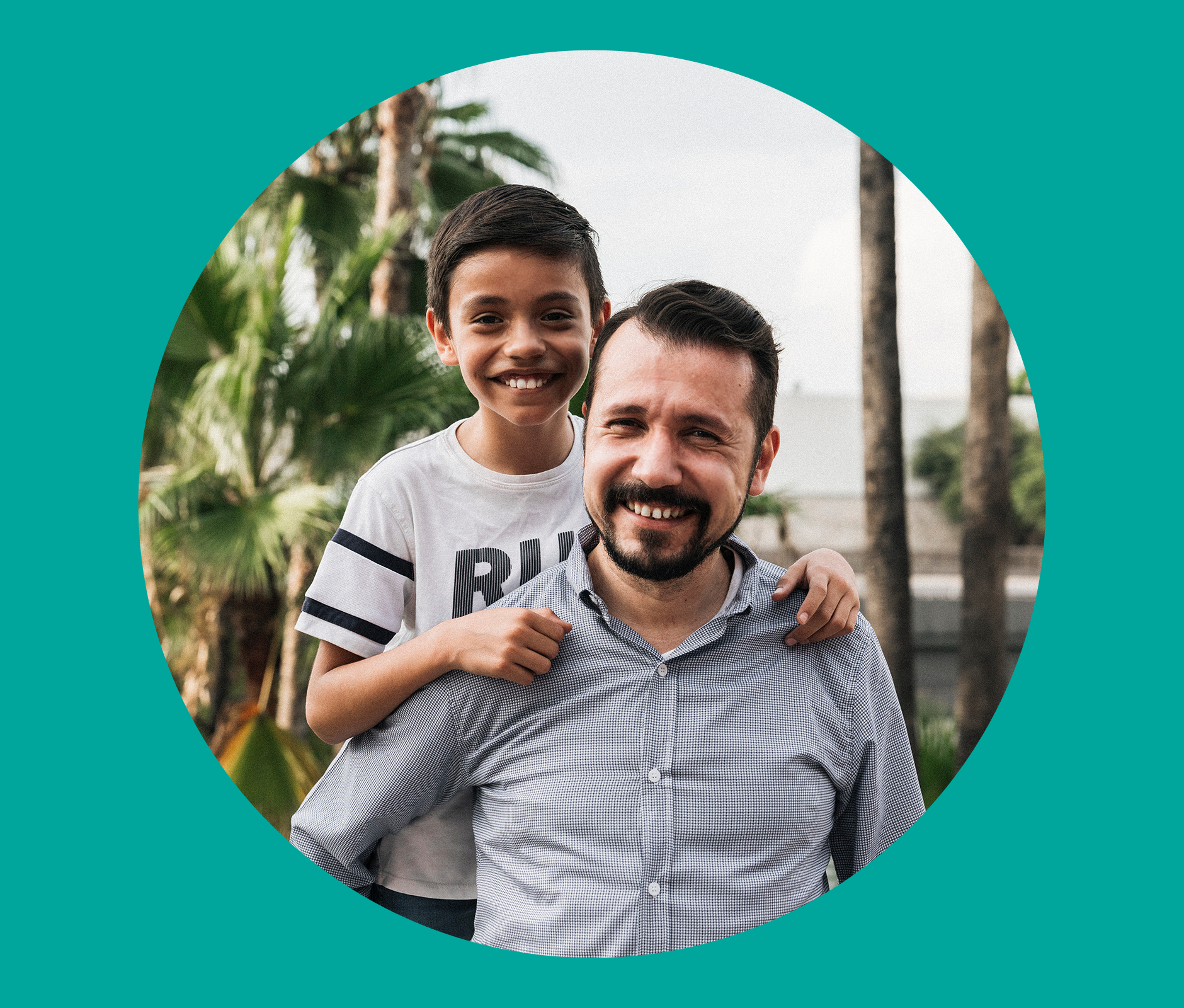 Dad lifting his son son on his back